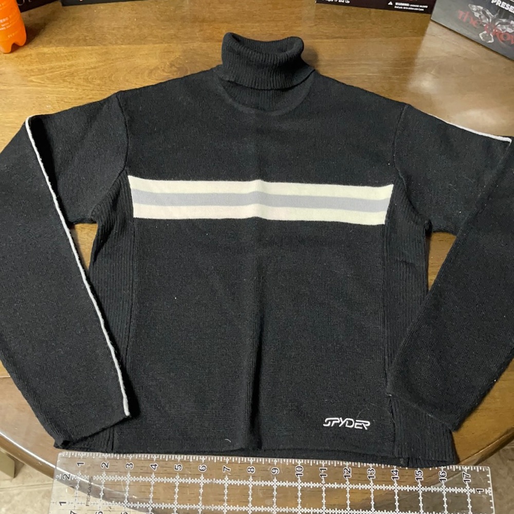 Spyder long sleeve knit sweater.